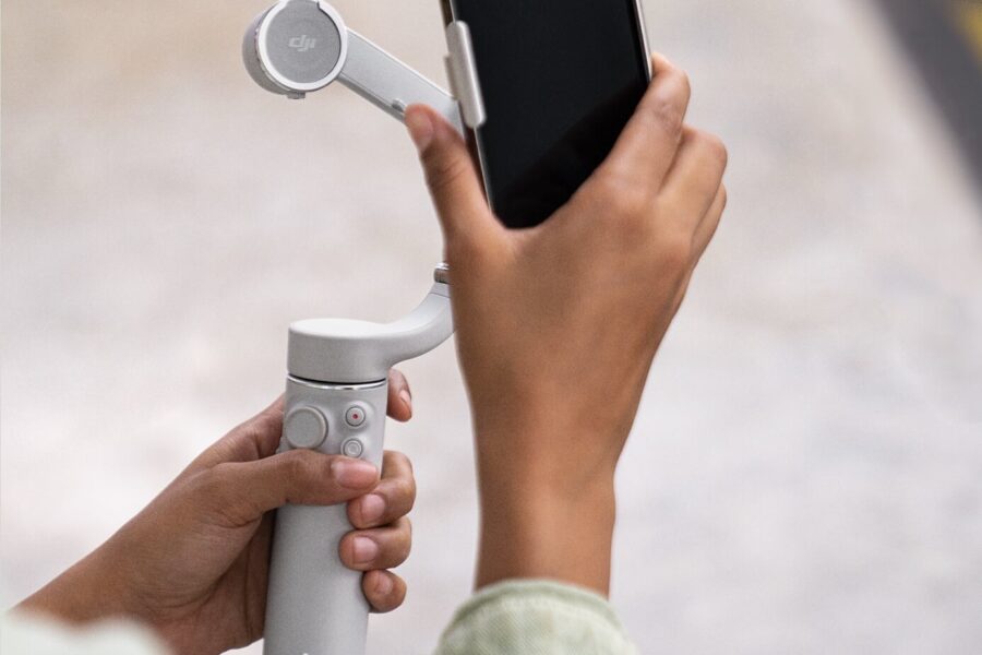 Woman Holding DJI Gimbal Six Review